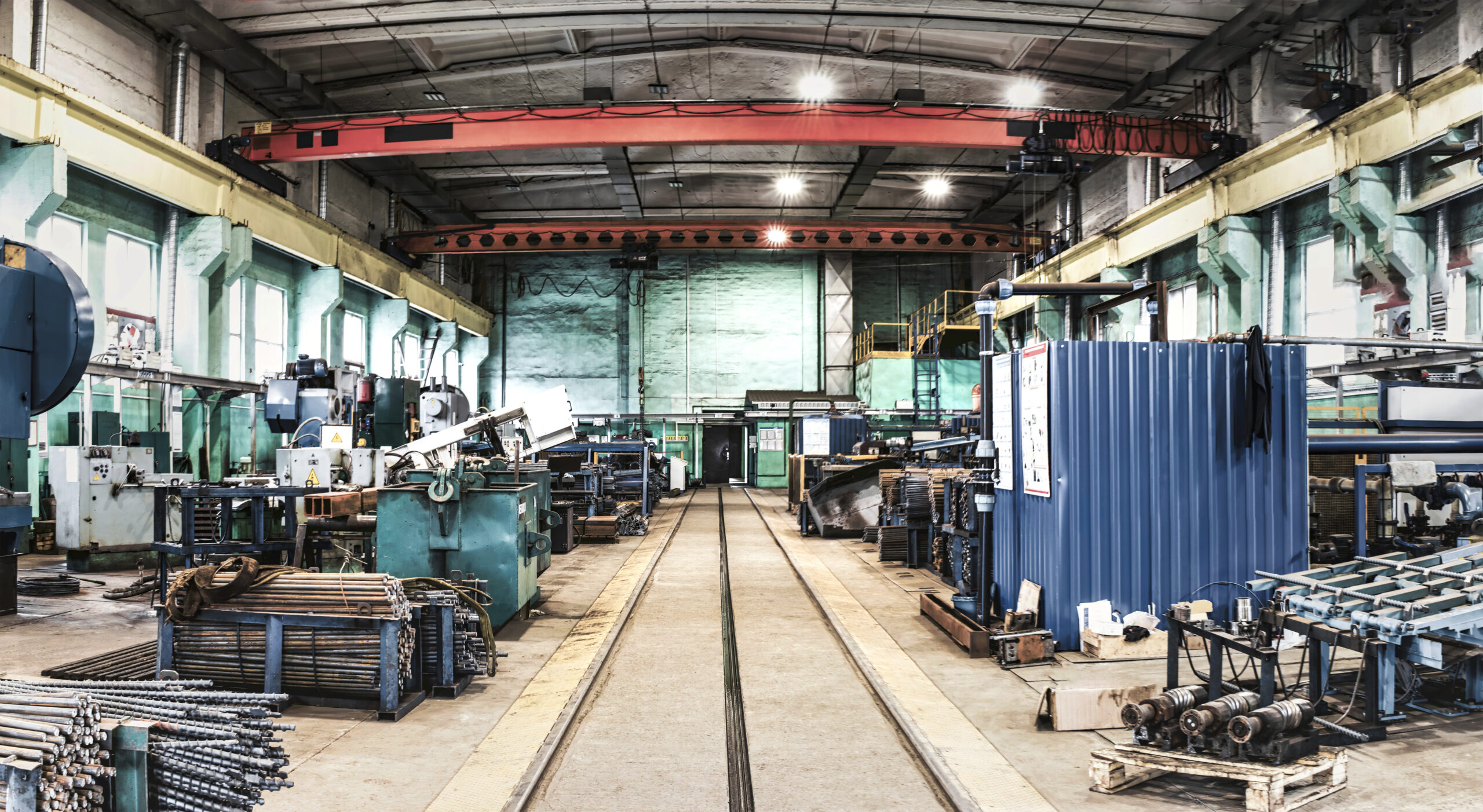 Interior of metalworking factory workshop hangar. Modern industrial enterprise production